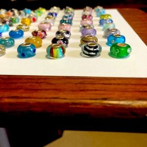 100 Pandora style beads with sterling silver centers!